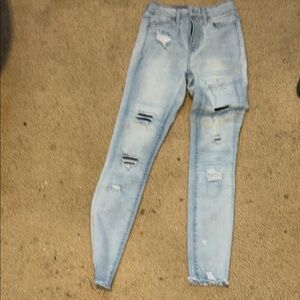 Women's Light Blue Distressed Jeans